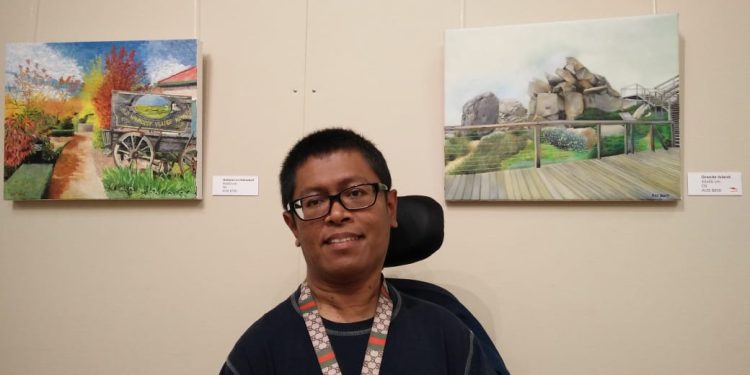 Faisal Rusdi: Melukis dengan Mulut, Mendobrak Stigma Disabilitas Cerebral Palsy
