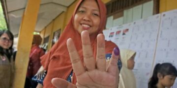 PEMILU 2024: Banjir Menyurut, Warga Demak Lakukan Pencoblosan